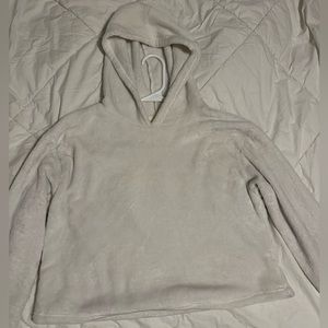 A white, soft cropped at waist sweater. Made by So, size M (Medium) in juniors